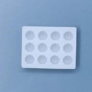 12-cavity white silicone shell mold for baking chocolate, candy, and DIY soap crafts