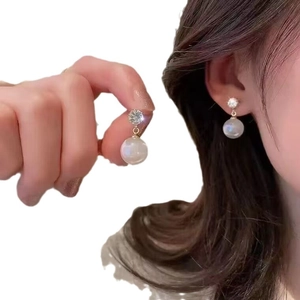 Elegant 925 silver needle drop earrings with sparkling rhinestones and large white pearls