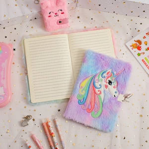 Rainbow plush unicorn notebook set with lock, stationery and embroidered journal details