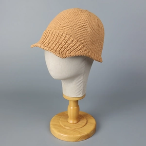 Detailed view of the fine knit texture on a khaki summer breathable peak hat for women