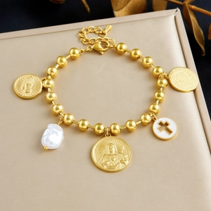 Gold-plated stainless steel bracelet with baroque pearl and religious cross pendants