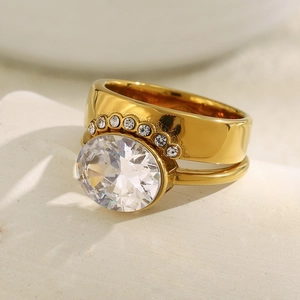18K gold plated stainless steel ring with dual oval zircon stones on stone base