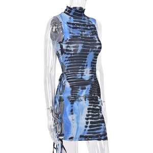 Detail of blue and black tie-dye bodycon dress featuring side lace-up cutout design