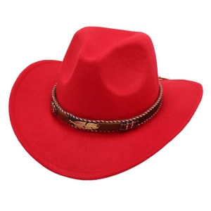 Red felt cowboy hat featuring brown braided band with golden feather and bead accents