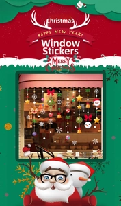 Detail view of colorful Christmas window clings with Santa Claus and festive ornaments