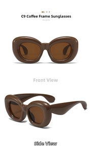 Detail view of bold bubble frame sunglasses in dark coffee color with tinted brown lenses
