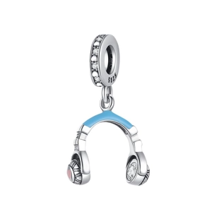 Macro detail of S925 silver headphone charm with blue enamel and pink sparkling stones