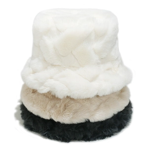 Winter plush bucket hats in white, beige, and black colors with thick fuzzy texture