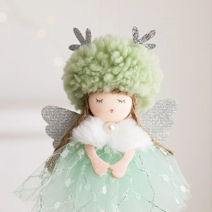 Mint green Christmas angel ornament with silver antlers, mesh skirt, and faux fur details