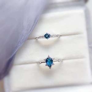 Elegant S925 sterling silver pear-cut blue gemstone turtle ring with diamond accents