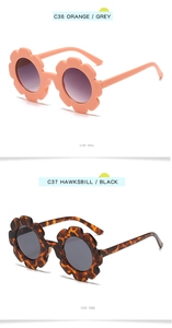 Detailed side view of flower-shaped kids' sunglasses in orange and tortoiseshell colors