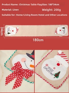 Close-up of burlap Christmas table runner with embroidered snowman and size dimensions