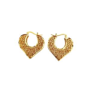 Vintage style hollow heart-shaped earrings in gold-plated copper with intricate details