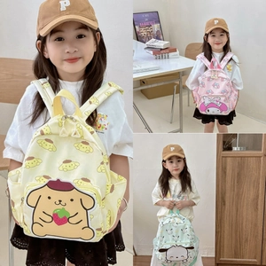 Detailed view of children mini bucket bags featuring colorful Sanrio character prints