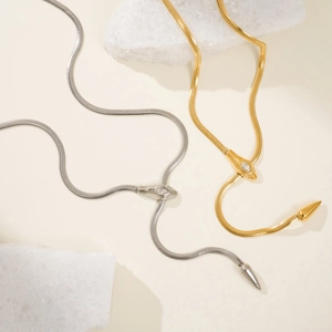 Flat 18k gold and silver snake chain necklaces with crystal snake head pendants