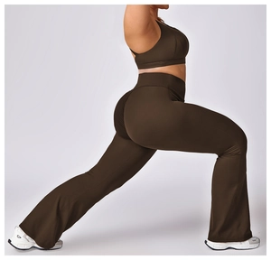 Close-up of dark coffee high-stretch sports bra and flared yoga pants on model