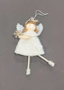Macro detail of plush angel ornament featuring white fur dress and gold glitter accents