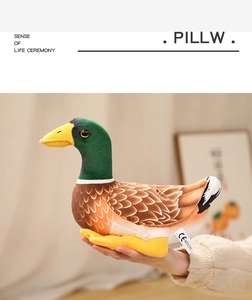 Detail of lifelike mallard plush toy with vivid feather texture and safety CE label