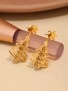 Detailed view of hollow Christmas tree earrings with star stud in 18K gold plating