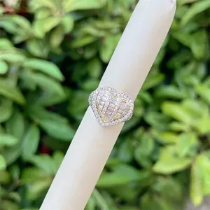 18K gold plated heart ring with pave set cubic zirconia stones on a silver base