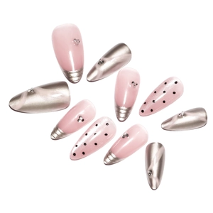 3D silver chrome and pink cat eye press-on nails with rhinestones and ribbon accents