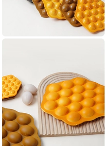 Realistic yellow PU egg waffle model with semi-spherical texture for snack display