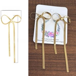Elegant 18K gold-plated stainless steel bow earrings with long tassel chain detail