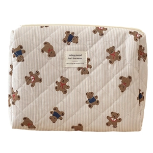 Quilted cotton makeup bag with pink stripes and bear prints for travel and storage