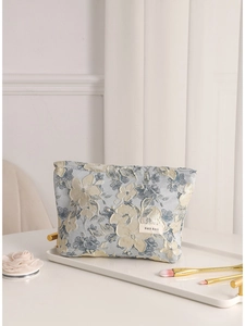 Floral jacquard makeup bag with relief texture and a stylish vintage gray-blue pattern