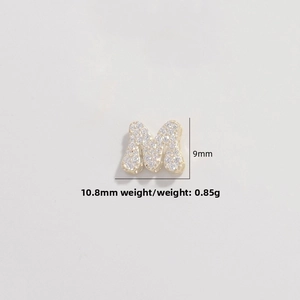 Detailed view of gold-plated M letter charm with zircons and measurements 10.8mm by 9mm