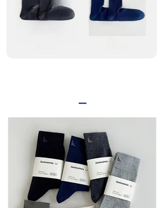 Close-up of four-color cotton business socks featuring letter 'b' embroidery detail