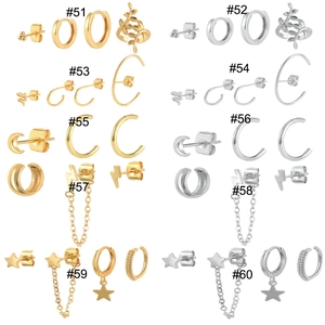 Detailed catalog of mixed earring sets with stars, moons and leaves in gold and silver