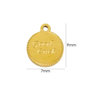 Detailed view of a 7x9mm gold-plated stainless steel charm engraved with Good Luck text