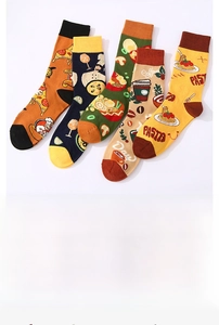 Flat lay of five creative mid-tube socks with pasta and coffee food cartoon patterns