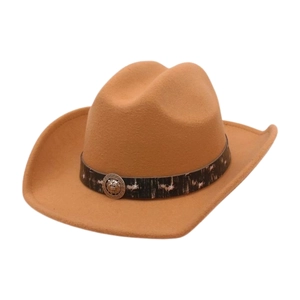 Detail of camel wool western cowboy hat with a star band and silver lion head buckle