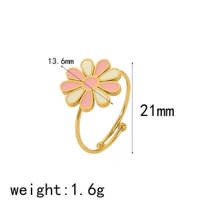 Detail shot of daisy open ring with pink enamel petals and 13.6mm floral diameter