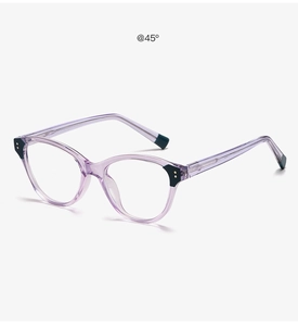 Detail view of purple cat-eye glasses with black temple accents and green tips