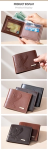 Detail view of the interior slots and eagle embossed leather of this men's bifold wallet