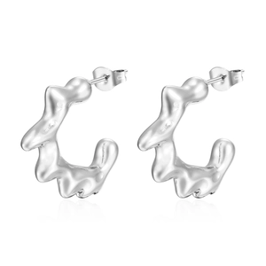 Irregular wave-shaped silver stainless steel earrings with a liquid metal texture