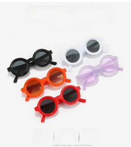Detail view of round frame sunglasses in black, white, orange, purple and red options