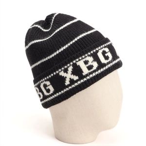 Detailed view of striped black knit beanie with white XBG letter jacquard and texture