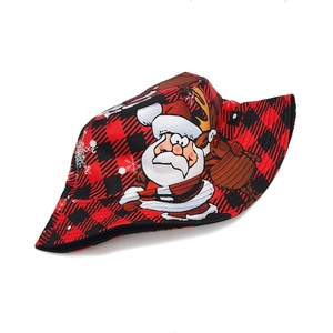 Detail of red and black buffalo plaid bucket hat with Santa and reindeer cartoon prints