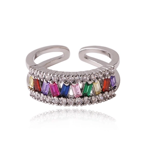 Detail of multi-color zircon ring with silver band and rectangular gemstone stones