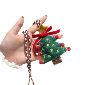 Handcrafted Christmas tree pendant necklace with green flocking and red velvet bow detail