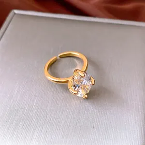 Luxurious gold plated adjustable ring featuring a brilliant oval zircon gemstone