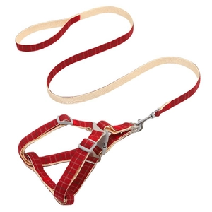 Adjustable red plaid dog harness and leash set made of durable webbing with metal buckle