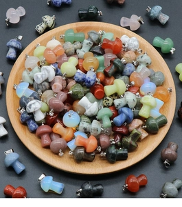 Macro view of assorted natural crystal mini mushrooms with metal loops in a wooden bowl