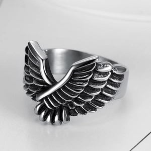 Retro stainless steel flying eagle wing ring for men shown from a 45-degree angle
