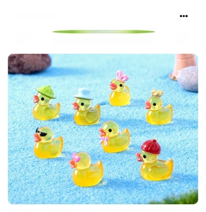 Detailed set of 8 mini luminous duck resin figurines with cute colorful headwear accessories