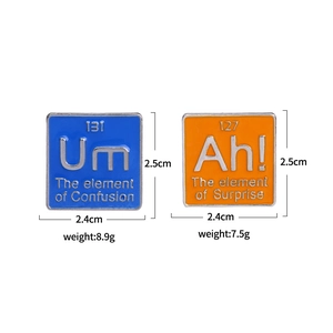 Lot de pins émaillés créatifs avec designs bleu Um et orange Ah! du tableau périodique